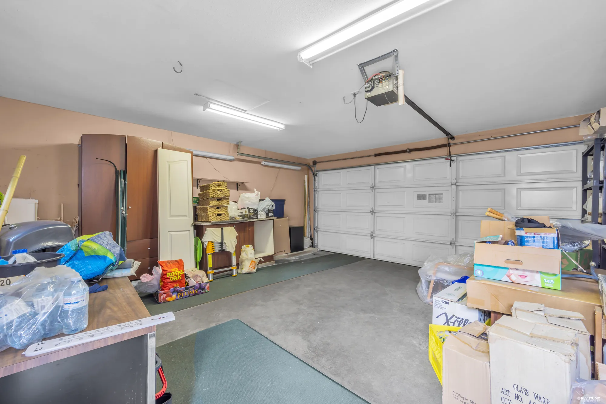 Inside the double garage, in use for storage
