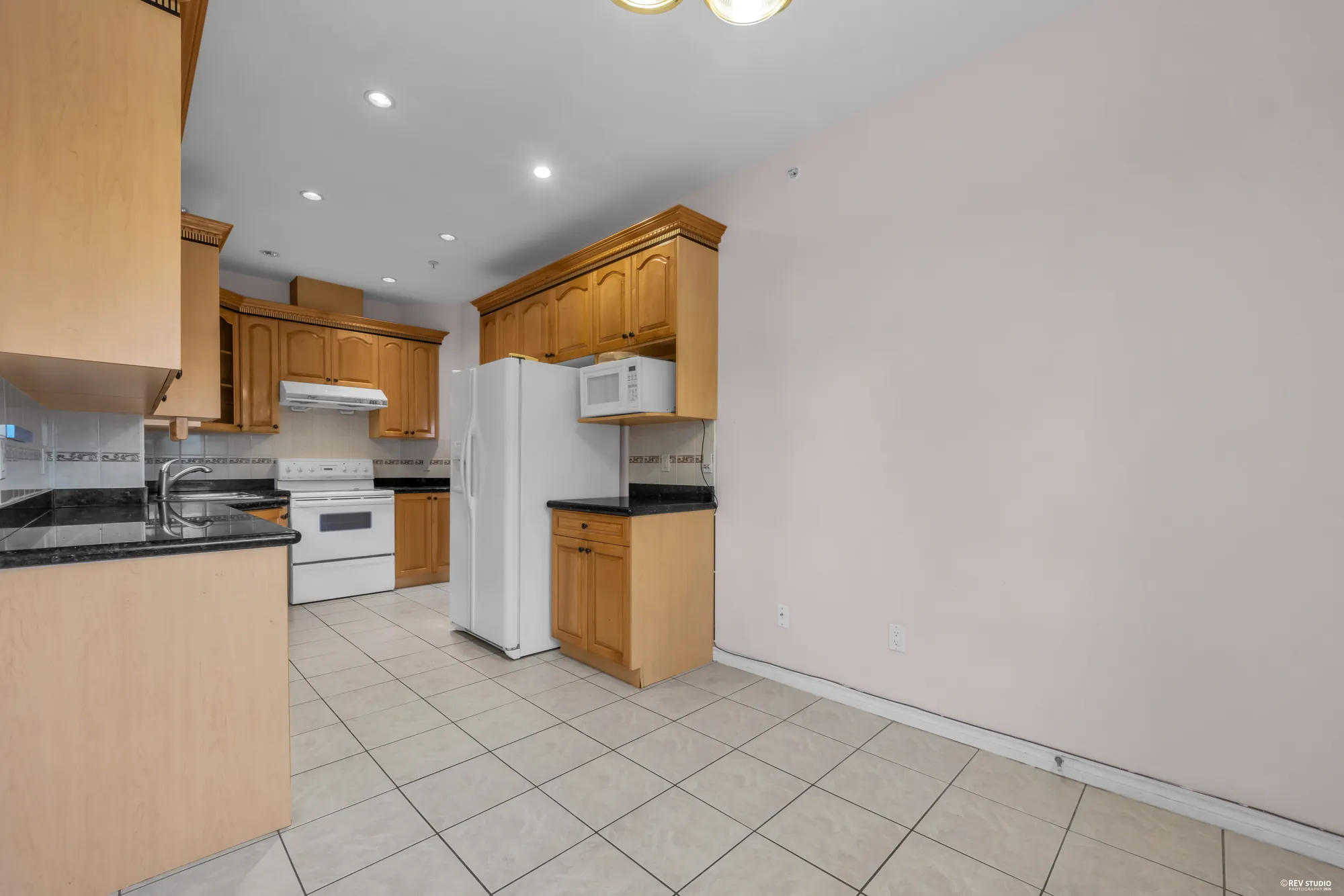 The main-floor kitchen from the far end of the run